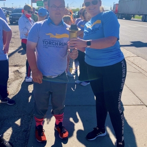 Misti Duncan with Athlete and Torch